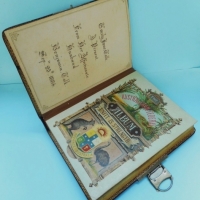 Edwardian Leather bound photograph album with decorative pages - Sold for $98 - 2016