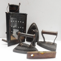 Group with 3  sad irons oil, triangular lamp and boat level - Sold for $73 - 2016