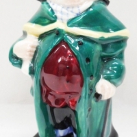 Royal Doulton china figurine - Mr Bumble - series one M76, designed by L Harradine, issued 1939 - 1982, stamped to base, approx 12 cm H - Sold for $24 - 2016