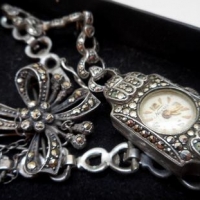 2 x pces Vintage silver Marcasite incl Oblong shaped Cocktail watch (af) & floral bow Brooch - Sold for $30 - 2016