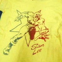 Original 1970's Retro STAN LEE CAPTAIN AMERICA 34 sleeve T-SHIRT - Original Chester Martin London label, yellow w Coloured image & text to front -smal - Sold for $49 - 2016