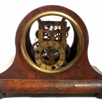 Skeleton Mantle clock in domed walnut veneer case - Sold for $67 - 2016