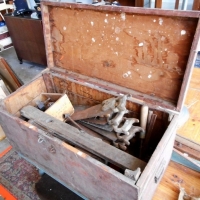Wooden chest full of carpenters tools including coffin makers tenon saw, bow saw, chisels, dumpy level etc - Sold for $122 - 2016