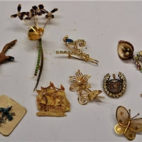 Box lot vintage costume Brooches - incl Large diamante and enamel orchid spray, love birds, filigree butterfly, diamante, galleon, bird etc - Sold for $50 - 2018