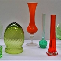 Group of coloured glass including green bowls orange vases etc - Sold for $27 - 2018