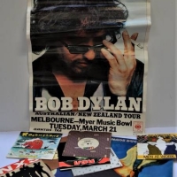 Group of items including Box of Single 45rpm records including Run DMC, Pat Benatar, Wang Chung, Bob Dylan poster and Galapagos duck Album - Sold for $35 - 2018