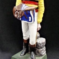 Painted jockey figurine with saddle - Sold for $37 - 2018