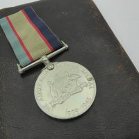 2-pieces-inc-The-Australian-Service-Medal-1939-1945-details-sighted-to-side-vintage-mens-oblong-wallet-Sold-for-56-2020