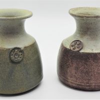 Gus-McLaren-1923-2008-Pair-Australian-Pottery-Vases-bulbous-bases-slender-necks-flared-tops-both-with-applied-cameos-to-fronts-Earthy-toned-Sold-for-106-2020