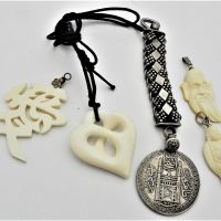 Small-box-carved-Chinese-etc-bone-charms-pendants-medal-on-silver-fob-strap-Sold-for-87-2020