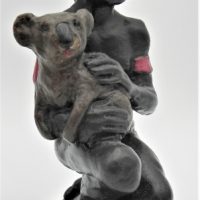 Australian-Chalkware-Figure-of-An-Aboriginal-Boy-Holding-A-Koala-18cm-H-Sold-for-43-2021