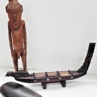 Group-lot-Tribal-inc-Vintage-PNG-Sepik-Carved-wooden-Tribal-Figure-heavily-carved-incised-decoration-56cm-H-Carved-Long-Boat-and-oval-shallow-Sold-for-50-2021