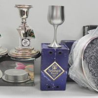 Group-lot-incl-STRACHAN-Placemats-Pair-Candlesticks-Selangor-Pewter-Goblets-Set-of-coasters-Sold-for-50-2021