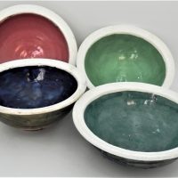 Gus-McLaren-1923-2008-4-x-Australian-Pottery-Bowls-White-rim-bands-varying-colours-and-exterior-glazes-3-signed-to-base-some-slight-damag-Sold-for-112-2021