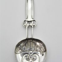 Liberty-Co-Cymric-Sterling-Silver-Coronation-Caddy-Spoon-designed-by-Archibald-Knox-hmarked-Bham-1901-Sold-for-807-2021