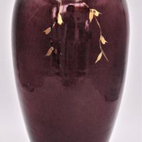 Ted-Secombe-Australian-Studio-Pottery-Vase-deep-red-glaze-with-Gilt-Leaf-Branch-design-to-front-back-signed-to-base-30cm-H-Sold-for-93-2021