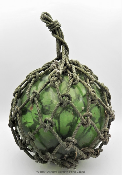 Sold at Auction: Vintage green glass fishing float, with rope covering.  22cm in Dia Approx.