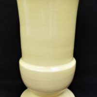 Klytie-Pate-Australian-Pottery-Vase-classical-shape-with-footed-base-flared-top-pale-Yellow-Glaze-with-Green-Interior-incised-signature-to-base-Sold-for-161-2021