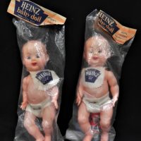 2-x-packaged-1960s-plastic-Heinz-baby-Dolls-wearing-Heinz-57-bib-nappy-25cms-L-with-access-Sold-for-62-2021
