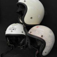 3-x-Vintage-White-Open-faced-Motorcycle-Helmets-Some-w-StickersDecals-Sold-for-43-2021