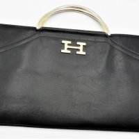 Vintage-black-leather-Hermes-oblong-handbag-with-H-gilt-logo-handles-zipped-central-section-lined-with-monogram-Fabric-2-outer-sections-35cms-W-Sold-for-75-2021