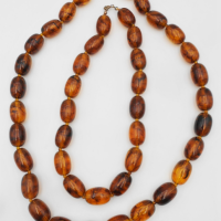 2-x-vintage-Amber-necklaces-large-oval-beads-60cms-40cms-L-Sold-for-174-2021