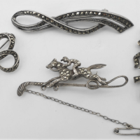 4-x-vintage-Marcasite-Brooches-some-silver-inc-racehorse-on-whip-floral-spray-bow-etc-Sold-for-50-2021