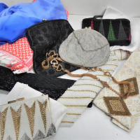 Group-lot-Ladies-items-inc-Vintage-silver-beaded-evening-bag-sequinned-bags-beaded-1980s-tie-Silk-scarves-Fine-woven-wool-shawl-etc-Sold-for-87-2021