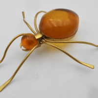 Vintage-gilt-Amber-spider-Brooch-Sold-for-62-2021