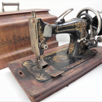 c1900-French-hand-crank-sewing-machine-in-its-original-wooden-case-inscribed-Noble-Silencieuse-by-maker-Gabriel-Malgat-c1900s-af-Sold-for-68-2021