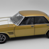 Classic-Carlectable-118-scale-model-Diecast-Holden-HQ-Monaro-GTS-4-Door-Gold-with-White-Stripes-Sold-for-99-2021