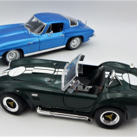 2-x-118-Scale-Model-Diecast-Cars-incl-a-1965-Chevrolet-Corvette-Sting-Ray-in-metallic-blue-body-Maisto-and-a-Shelby-Cobra-427SC-in-British-Racing-G-Sold-for-124-2021
