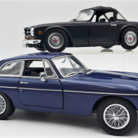 2-x-118-Scale-Model-Diecast-English-Sports-Cars-1974-Triumph-TR6-with-hardtop-black-body-ERTL-and-a-1965-MGB-GT-Coupe-blue-body-Universal-Hobb-Sold-for-130-2021