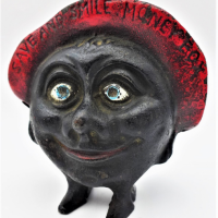 Cast-iron-Money-box-smiley-face-with-red-hat-with-Save-and-Smile-Money-Box-text-Sold-for-56-2021
