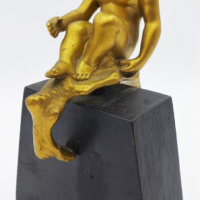 Vintage-Gilt-Bronze-figure-of-Puck-seated-mounted-to-wooden-base-Sold-for-50-2021