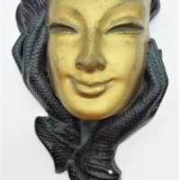 Vintage-Plaster-Art-Deco-Wall-mask-lady-holding-gone-tone-mask-with-hands-Sold-for-161-2021