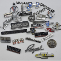Group-Lot-of-mixed-car-badges-incl-Chrysler-Valiant-Triumph-Sold-for-68-2021