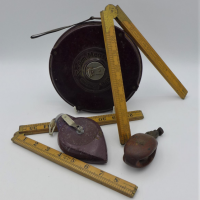 Small-group-lot-Bakelite-cased-Tape-Measure-Line-Marker-fold-out-rulers-etc-Sold-for-68-2021