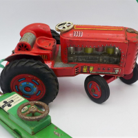 Vintage-Modern-Toys-Japanese-tin-toy-Remote-control-Tractor-clear-Perspex-engine-with-working-cylinders-Sold-for-62-2021