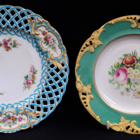 2-x-19th-Century-Continental-Cabinet-Plates-with-hand-painted-floral-designs-inc-one-with-reticulated-rim-no-marks-sighted-Sold-for-99-2021