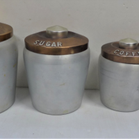 Set-of-4-x-Mid-Century-Modern-Kitchen-Cannisters-Brushed-Aluminium-bodies-Anodised-lids-with-embossed-contents-text-marked-made-in-Italy-to-base-Sold-for-50-2021