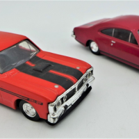 2-x-Scale-Model-Diecast-Cars-inc-OrangeRed-Ford-Falcon-351-GT-Deep-Red-Holden-Monaro-GT-both-by-Trax-Sold-for-112-2021