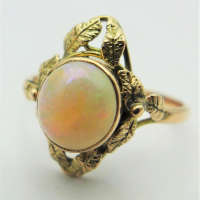 Ladies-9ct-ygold-ring-round-cabochon-white-opal-in-floral-setting-TW-2-4-grms-Sold-for-186-2021