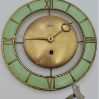 Vintage-Kaiser-Wall-Clock-Brass-body-with-light-green-enamel-paint-and-raised-Roman-numerals-Breguet-style-hour-hand-with-winding-key-working-and-Sold-for-137-2021