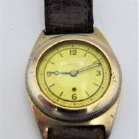 Worlds-First-Self-Winding-Wristwatch-by-John-Harwood-Swiss-patent-1924-in-a-gold-plated-Vita-Watch-case-and-dial-15-jewels-movement-marked-Harwo-Sold-for-932-2021