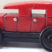 Wooden TOYCRAFT DEPRESSION TOY TRUCK, Painted Red, Black and Silver, with Toycraft Australia to 3 of 4 Wheels, L10cm - Sold for $220 - 2009