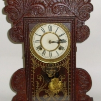 c1890 American WATERBURY 8 day time & strike COTTAGE CLOCK - ornate pendulum - reverse painted glass - working order - Sold for $98 - 2012