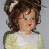 Late 1940/50's  Trio Doll Co (Melbourne) Composition walking doll with blue sleep eyes, brown wig, enclosed walking mechanism, 50cms L - Sold for $85 - 2012