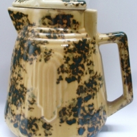 Australian pottery cream/green Electric Jug with raised Art Deco design - 23cm H (no cord) - Sold for $98 - 2012