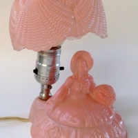 1930's pink glass crinoline lady trinket box/lamp approx 21cm height - Sold for $201 - 2012